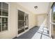 Comfortable screened porch with ample space for relaxing or entertaining at 1196 Harvester Circle # 1196, Myrtle Beach, SC 29579