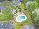 Aerial view of a community with a swimming pool, gazebo, and well-manicured landscaping at 1206 Erin Way # A, Myrtle Beach, SC 29577