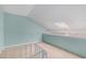 Attic space featuring carpeted floors, a skylight, and white railings at 1206 Erin Way # A, Myrtle Beach, SC 29577