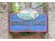 Sterling Village II sign with a serene heron and waterway scene, framed by brick pillars, inviting to a tranquil community at 1206 Erin Way # A, Myrtle Beach, SC 29577