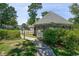 Picturesque gazebo surrounded by lush greenery, creating a peaceful retreat within a well-maintained community at 1206 Erin Way # A, Myrtle Beach, SC 29577