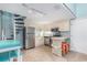 Efficient kitchen with stainless steel appliances, a breakfast bar, and unique spiral staircase at 1206 Erin Way # A, Myrtle Beach, SC 29577