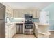 Well-equipped kitchen with stainless steel appliances and ample cabinet space, perfect for cooking at 1206 Erin Way # A, Myrtle Beach, SC 29577