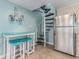 Cozy eat-in kitchen area with a spiral staircase leading to the upper level at 1206 Erin Way # A, Myrtle Beach, SC 29577