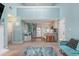 An open-concept kitchen and living area with stainless appliances, a spiral stair case and unique design at 1206 Erin Way # A, Myrtle Beach, SC 29577