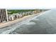 Breathtaking aerial view of the beach and condos, perfect for coastal living and vacation at 1310 N Waccamaw Dr. # 204, Garden City Beach, SC 29576
