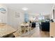 Open concept dining and living area with ocean views and comfortable furnishings at 1310 N Waccamaw Dr. # 204, Garden City Beach, SC 29576