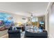 Comfortable living room with ocean-themed decor and a sliding door to the balcony at 1310 N Waccamaw Dr. # 204, Garden City Beach, SC 29576