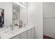 Bright bathroom featuring a double vanity with white cabinetry and a large mirror over the sinks at 160 Cart Crossing Dr. # 104, Conway, SC 29526