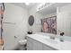 Well lit bathroom with a large mirror, modern sink, and floral shower curtain at 160 Cart Crossing Dr. # 104, Conway, SC 29526