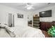 Inviting bedroom with a comfortable bed, TV, hardwood floors, and generous space for relaxation and storage at 160 Cart Crossing Dr. # 104, Conway, SC 29526