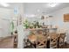 Well-lit dining area seamlessly connects to the modern kitchen, perfect for entertaining at 160 Cart Crossing Dr. # 104, Conway, SC 29526