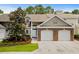 Charming townhouse with two-car garage, brick accents, and well-manicured landscaping at 160 Cart Crossing Dr. # 104, Conway, SC 29526
