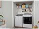 Modern laundry room features a washer, dryer, and ample shelving for organized storage at 160 Cart Crossing Dr. # 104, Conway, SC 29526