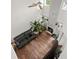 Aerial view of a living room with hardwood floors, plants, and a fireplace at 160 Cart Crossing Dr. # 104, Conway, SC 29526