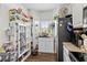 Bright pantry with ample storage, a variety of food items, and natural light from the window at 160 Cart Crossing Dr. # 104, Conway, SC 29526