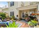 Welcoming patio with outdoor furniture, lush plants, and a cozy atmosphere for relaxing or entertaining at 160 Cart Crossing Dr. # 104, Conway, SC 29526