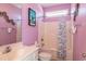 Well-maintained bathroom with a shower, vanity, and toilet at 163 Cypress Ave., Murrells Inlet, SC 29576