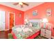 Tastefully decorated bedroom with flamingo-themed decor, bedside lamps, and a comfortable queen bed at 163 Cypress Ave., Murrells Inlet, SC 29576
