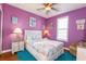 Cozy bedroom featuring a queen bed with ocean-themed bedding, plus two bedside tables at 163 Cypress Ave., Murrells Inlet, SC 29576