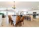 Spacious dining area with seating for eight, adjacent to the modern kitchen and living room at 163 Cypress Ave., Murrells Inlet, SC 29576
