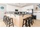 Modern kitchen with white cabinetry, granite countertops, stainless steel appliances, and bar-style seating at 163 Cypress Ave., Murrells Inlet, SC 29576
