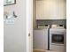 Bright laundry room featuring new side-by-side washer and dryer at 163 Cypress Ave., Murrells Inlet, SC 29576