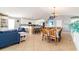 Open-concept living room and kitchen with nautical decor, modern appliances, and comfortable seating at 163 Cypress Ave., Murrells Inlet, SC 29576
