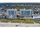 Stunning aerial view of beachfront condos with pools, offering a luxurious coastal living experience at 1903 S Ocean Blvd. S # 808, North Myrtle Beach, SC 29582