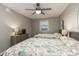 Bright bedroom with two beds, a ceiling fan, and a window at 1903 S Ocean Blvd. S # 808, North Myrtle Beach, SC 29582