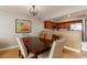 Elegant dining room with stylish seating and views of a modern, well-equipped kitchen at 1903 S Ocean Blvd. S # 808, North Myrtle Beach, SC 29582