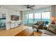 Relaxing living room with cozy seating and sliding glass doors to an ocean view balcony at 1903 S Ocean Blvd. S # 808, North Myrtle Beach, SC 29582