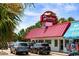Exterior of Hoskins Restaurant with a red roof and vintage sign, offering a glimpse of beach town charm at 1903 S Ocean Blvd. S # 808, North Myrtle Beach, SC 29582