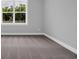 Bedroom with neutral carpet, paint and base trim with a beautiful backyard view at 1957 Indigo Cove Ln, Calabash, NC 28467