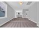Spacious bonus room with neutral carpet and plenty of natural light at 1957 Indigo Cove Ln, Calabash, NC 28467