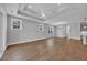 Open-concept room showcasing recessed lighting, generous windows, and seamless integration with a gourmet kitchen at 1957 Indigo Cove Ln, Calabash, NC 28467