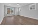 Bright bedroom with ample natural light, featuring luxury vinyl plank flooring and neutral walls at 1961 Indigo Cove Ln, Calabash, NC 28467