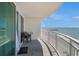 Spacious balcony with ocean view, metal fence, and a lounge chair at 201 S Ocean Blvd. # 1112, Myrtle Beach, SC 29577