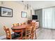 Cozy dining area with wooden table and chairs, perfect for intimate meals and gatherings at 201 S Ocean Blvd. # 1112, Myrtle Beach, SC 29577