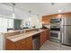 Well-equipped kitchen with stainless steel appliances, granite countertops, and an open layout at 201 S Ocean Blvd. # 1112, Myrtle Beach, SC 29577