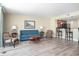 Inviting living room featuring comfortable seating, stylish decor, and a partial view of the kitchen at 201 S Ocean Blvd. # 1112, Myrtle Beach, SC 29577