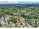 Aerial view of the neighborhood, showcasing lush greenery, nearby lakes, and the home's desirable location at 2017 Chadbury Ln., Myrtle Beach, SC 29588