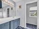 Bright bathroom features a vanity with white countertop and a view into another room at 2017 Chadbury Ln., Myrtle Beach, SC 29588