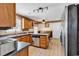 Functional kitchen with stainless steel appliances, tiled floors, and a cozy breakfast nook at 2017 Chadbury Ln., Myrtle Beach, SC 29588