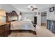Main bedroom with carpet, ceiling fan, and en-suite bathroom at 2017 Chadbury Ln., Myrtle Beach, SC 29588