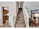 Carpeted staircase leading to the upper level, connecting the living spaces at 2017 Chadbury Ln., Myrtle Beach, SC 29588