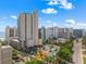 Stunning aerial view of a beachfront resort featuring a pool, a waterslide, and ocean views on a sunny day at 202 74Th Ave. N # 2547/2548, Myrtle Beach, SC 29572
