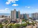 Beautiful aerial view of a Gathering-friendly beachfront resort with pools and a waterslide park on a sunny day at 202 74Th Ave. N # 2547/2548, Myrtle Beach, SC 29572