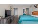 Bedroom showcases two beds, a TV stand, and a glimpse into the closet at 202 74Th Ave. N # 2547/2548, Myrtle Beach, SC 29572