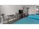 Bedroom setup includes a table with chairs and two beds and a TV at 202 74Th Ave. N # 2547/2548, Myrtle Beach, SC 29572